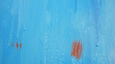abstract blue background. paint streaks. blue metal. blue color texture. blue abstract. brush marks. paint streaks. paint drops. Brush strokes of paint. Modern art. abstract art background.