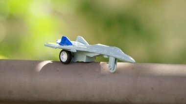 a toy. fighter aircraft. combat aircraft. aviation. plane crash. wings and turbines. Ukrainian aviation. Military Fighter