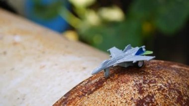 a toy. fighter aircraft. combat aircraft. aviation. plane crash. wings and turbines. Ukrainian aviation. Military Fighter