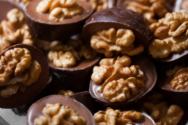 Walnut in chocolate — Stock Photo, Image