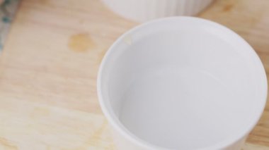 Filling Ramekin with Apples