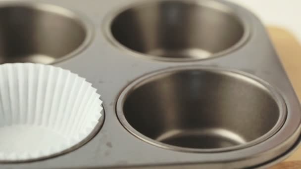 Placing Cupcake Wrappers — Stockvideo