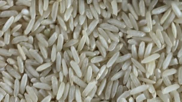 Detailní Záběr Hnědé Rýže Nabrané Dřevěnou Lžící — Stock video