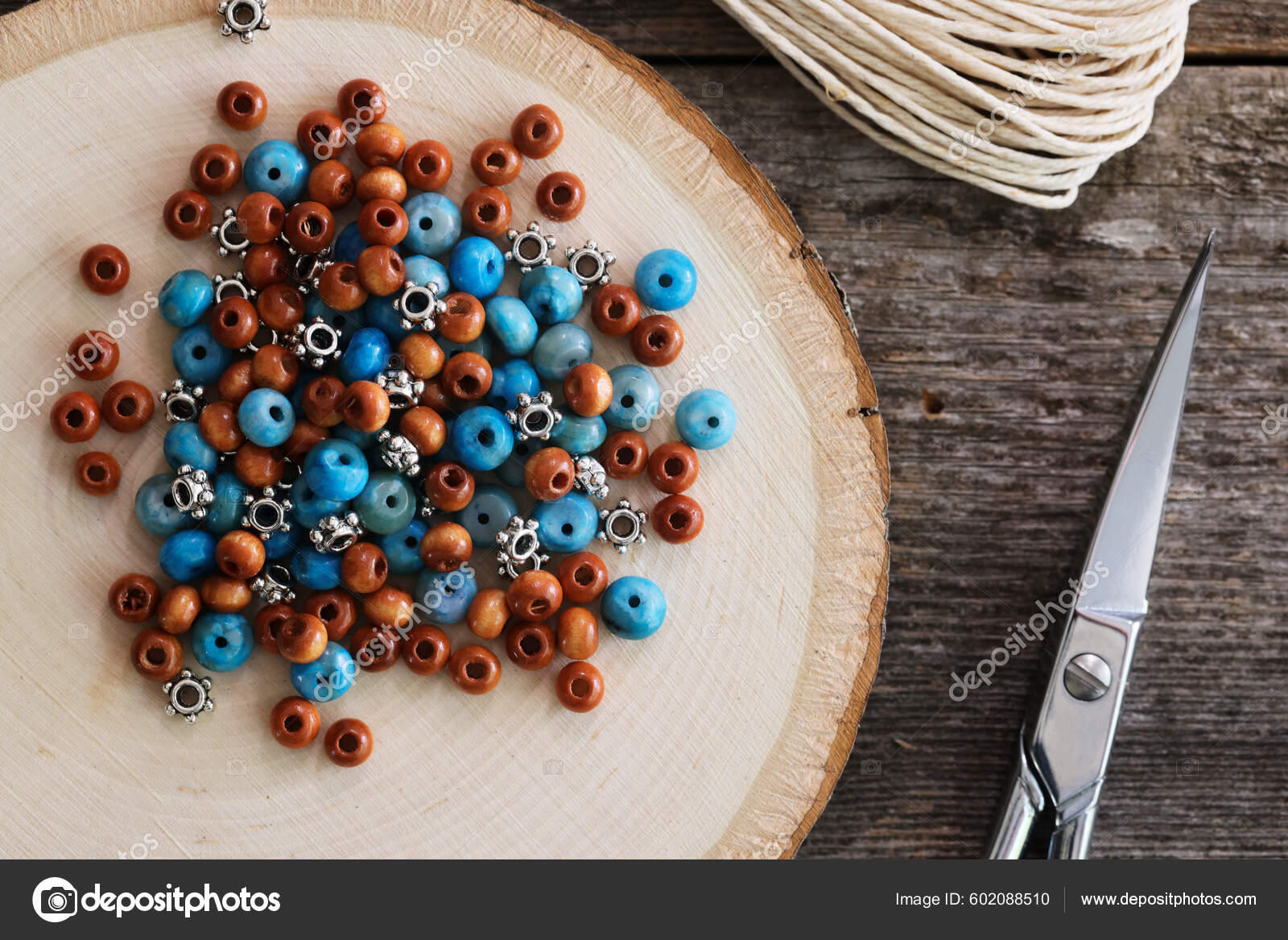 Pile Wooden Turquoise Metal Beeds Wooden Surface Sissors Cord Jewelry Stock  Photo by ©charlotteLake 602088510