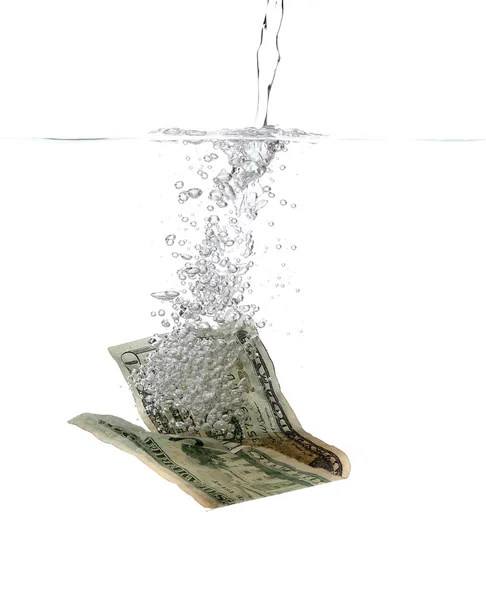 Dollar bankbiljet in water en bubbels — Stockfoto