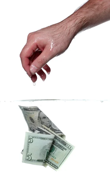 Billets main et dollar dans l'eau — Photo