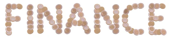 Фінанси - написані монетами на білому тлі — стокове фото