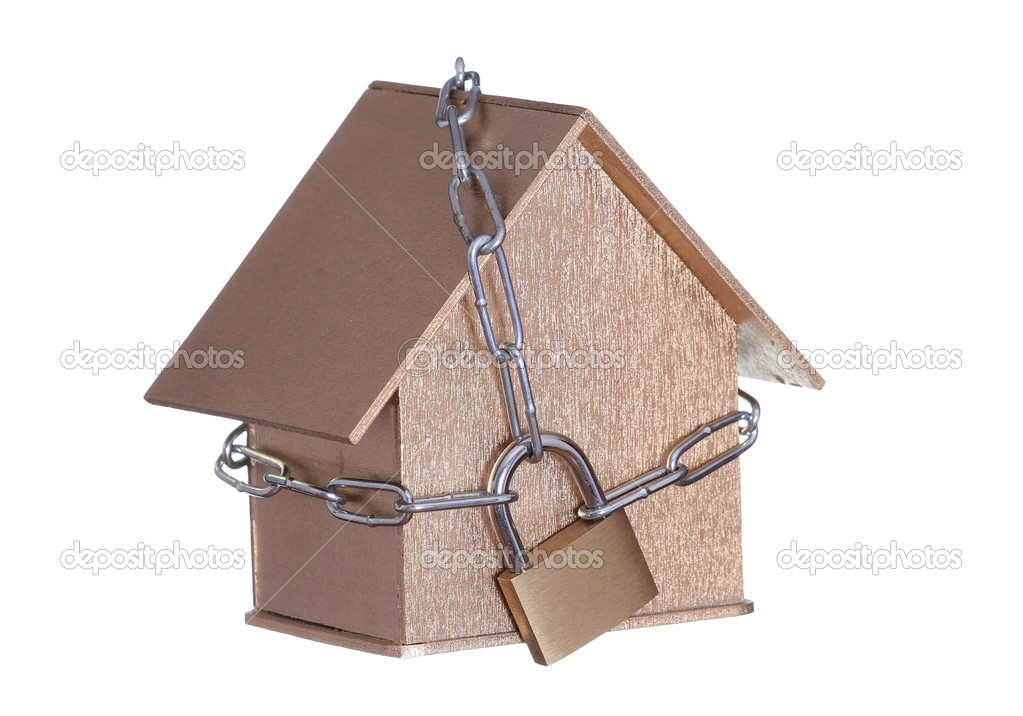Golden home protected with padlock and chain