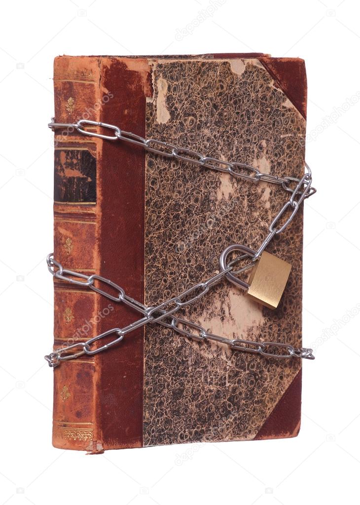 old historic book protected with padlock and chain