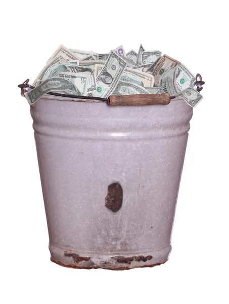 Dollars in old rusty bucket — Stock Photo, Image