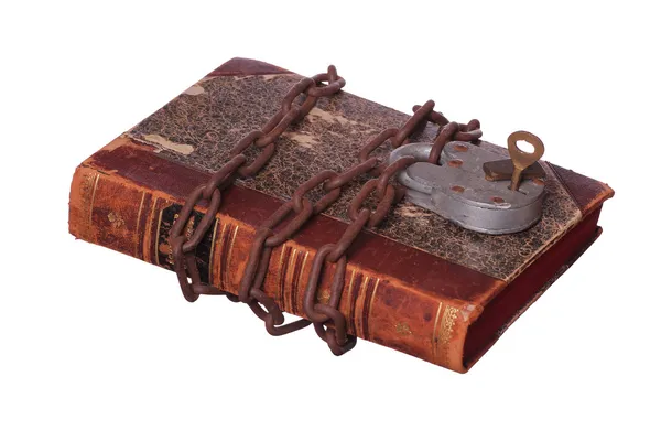 Rusty chain and padlock on old book — Stock Photo, Image