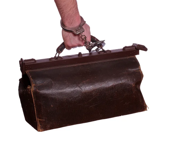 Стара шкіряна сумка з наручником — стокове фото