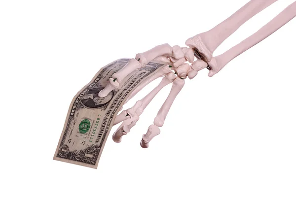 Un dollaro in mano scheletro — Foto Stock
