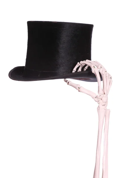 Old hat with skeleton hand — Stock Photo, Image