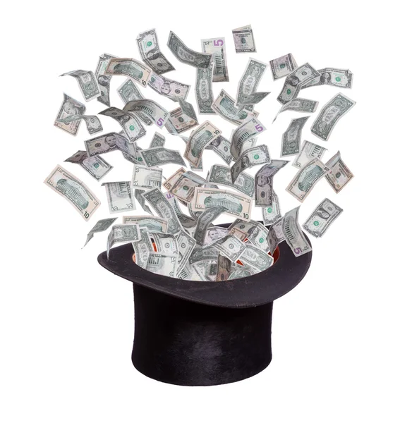 Dollars flaying out of old hat — Stock Photo, Image