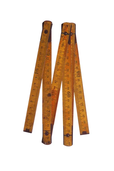 Старое желтое измерительное устройство — стоковое фото