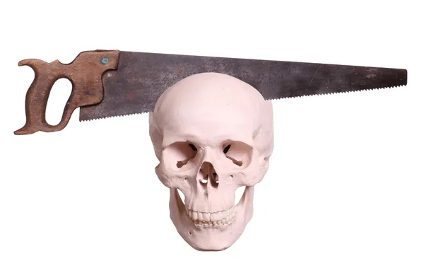 Old saw cutting in skull — Stock Photo, Image