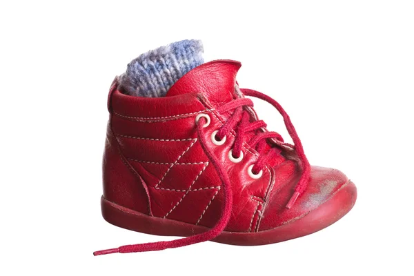 Old red used baby shoes — Stock Photo, Image