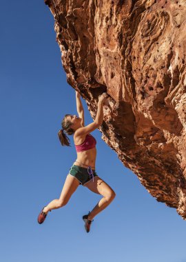 Breath-taking rock climber. clipart