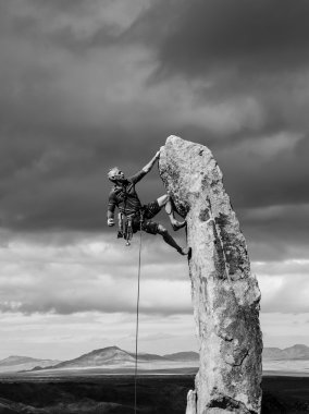 Climber on the edge. clipart