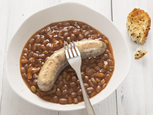 Baked beans and sausage — Stock Photo, Image