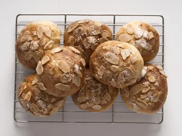 Golden almond buns — Stock Photo, Image