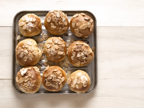 Golden almond buns — Stock Photo, Image