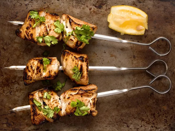 Barbecued chicken skewer — Stock Photo, Image