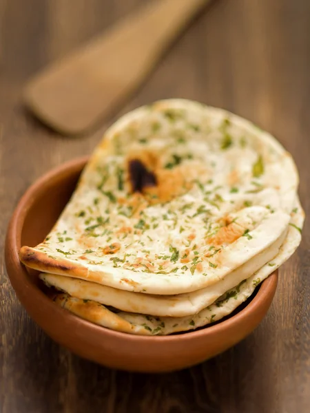 Rustic indian naan bread — Stock Image Rustic indian naan bread Stock Photo