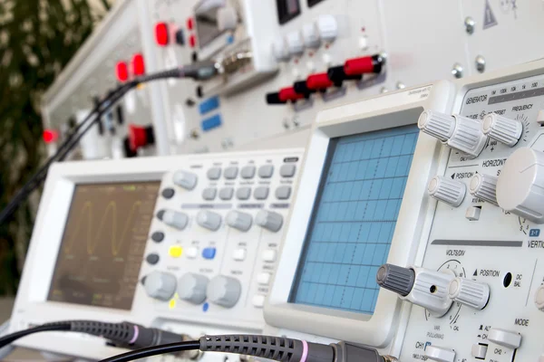 Analog and digital oscilloscope in the foreground — Stock Photo, Image