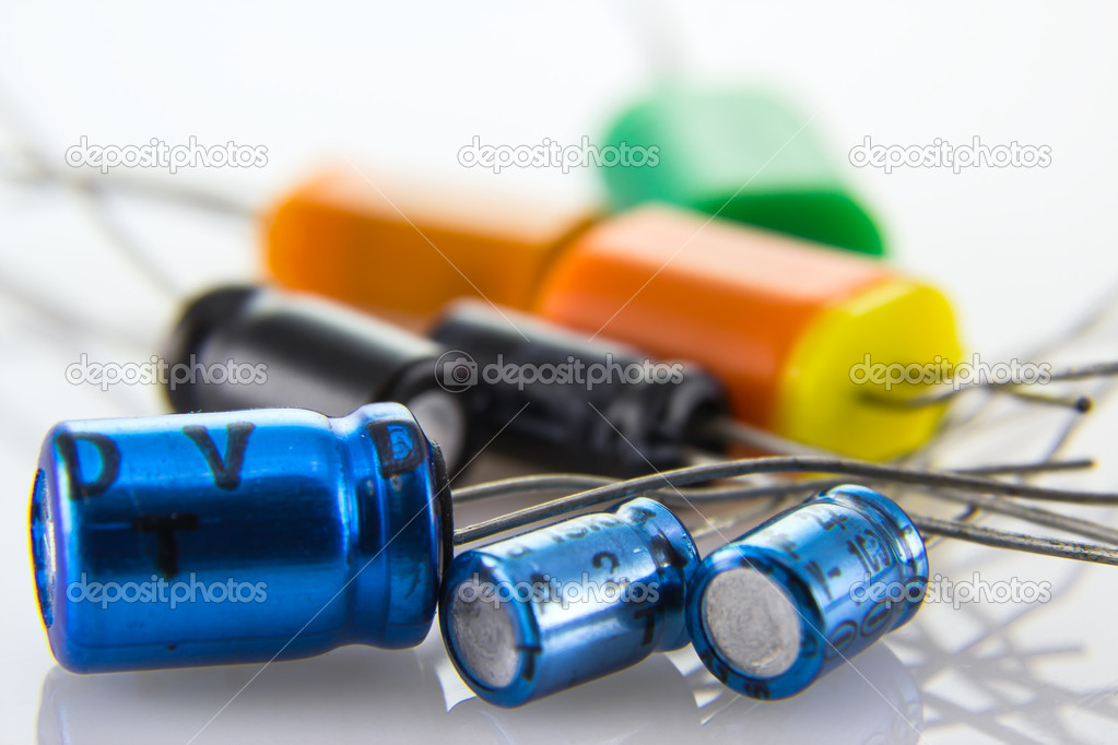 Electrolytic capacitors in metal and plastic housings Stock Photo by