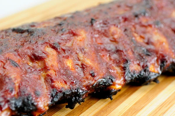 pork bbq ribs, meaty ribs smothered with bbq sauce