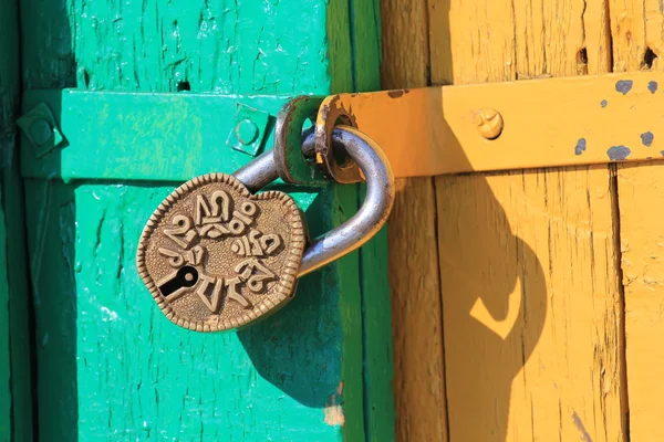 Padlock with prayer — Stock Photo, Image