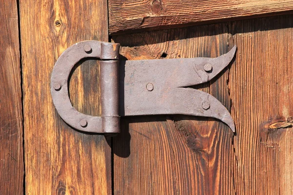 Forged old door hinge — Stock Photo, Image