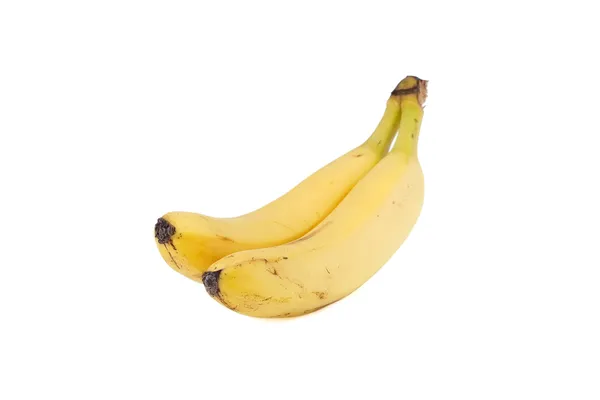 Dwie żółte banany na białym tle — Zdjęcie stockowe
