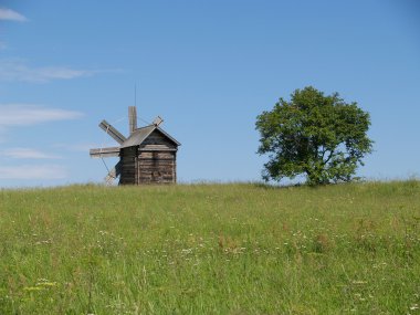 Karelia, Russia. Old windmill in the memorial estate Kizhi clipart
