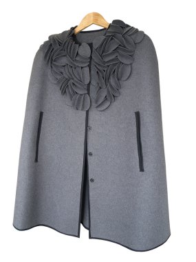 Ladies coat cape on a white background clipart