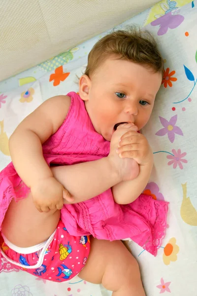 Eight Month Old Girl Pulls Her Leg Her Mouth — Stock Photo, Image