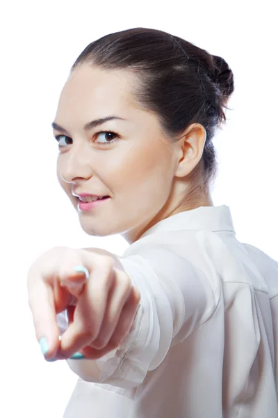 Smiling woman shows finger — Stock Photo, Image