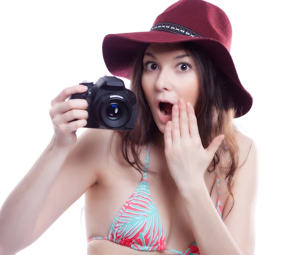 Lachende vrouw met professionele camera — Stockfoto