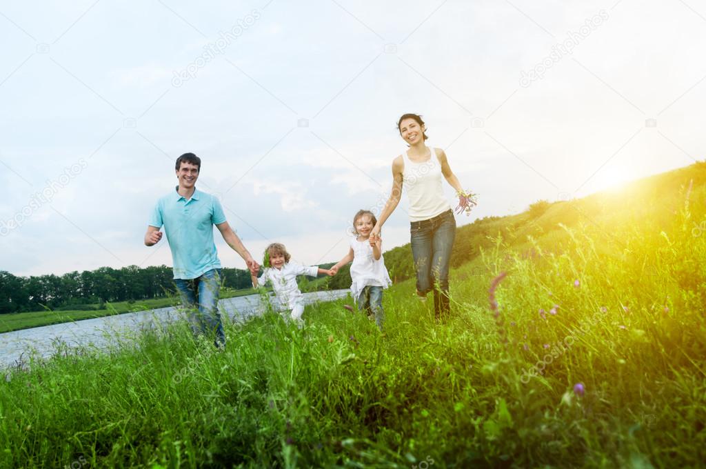 happy family having fun outdoors