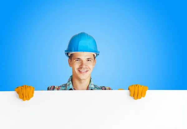 Worker with blank board — Stock Photo, Image