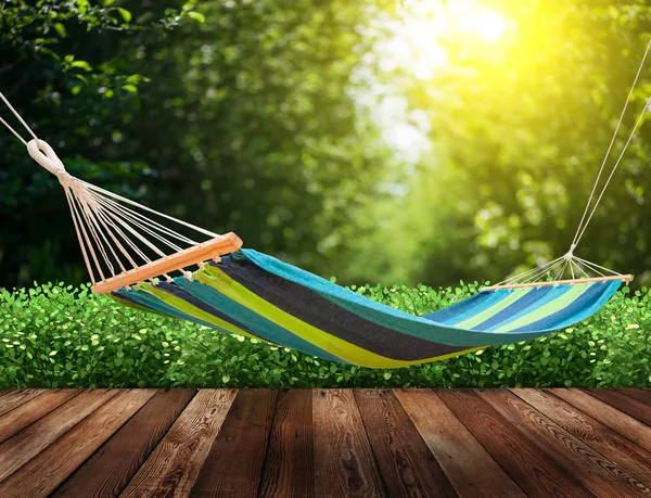 Relaxing on hammock in garden — Stock Photo, Image