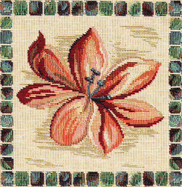 Closeup of retro tapestry fabric pattern with classical image of the colorful floral ornament