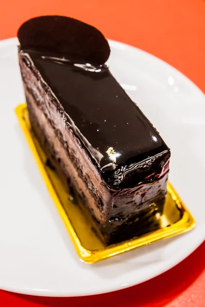Dark chocolate on dish — Stock Photo, Image