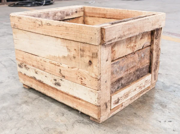 Wooden box on floor — Stock Photo, Image