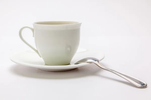 Copo de café branco com colher — Fotografia de Stock