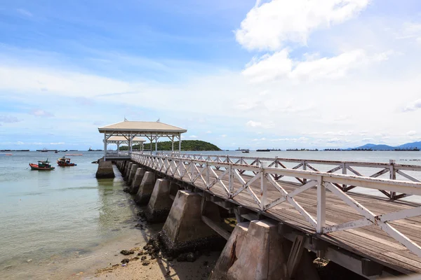 White wooden bridge into the sea — Stock Photo, Image