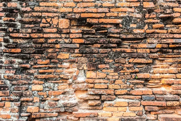 Antiguo muro de ladrillo naranja — Foto de Stock