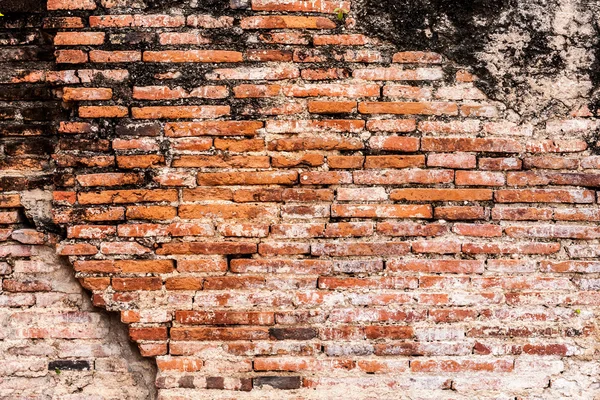 Antiguo muro de ladrillo rajado naranja —  Fotos de Stock